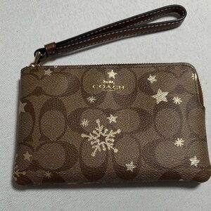 Coach Brown Wristlet with Snowflake Accents